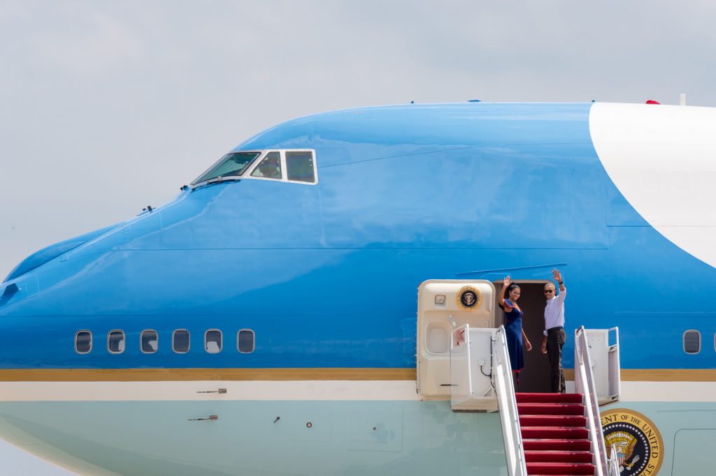 I photographed the Obama family boarding Air Force One and taking off.